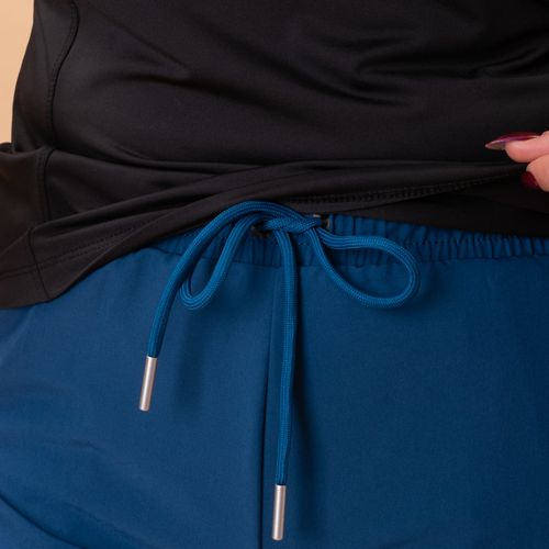 SHORT CON LICRA ROMPEVIENTOS AZUL